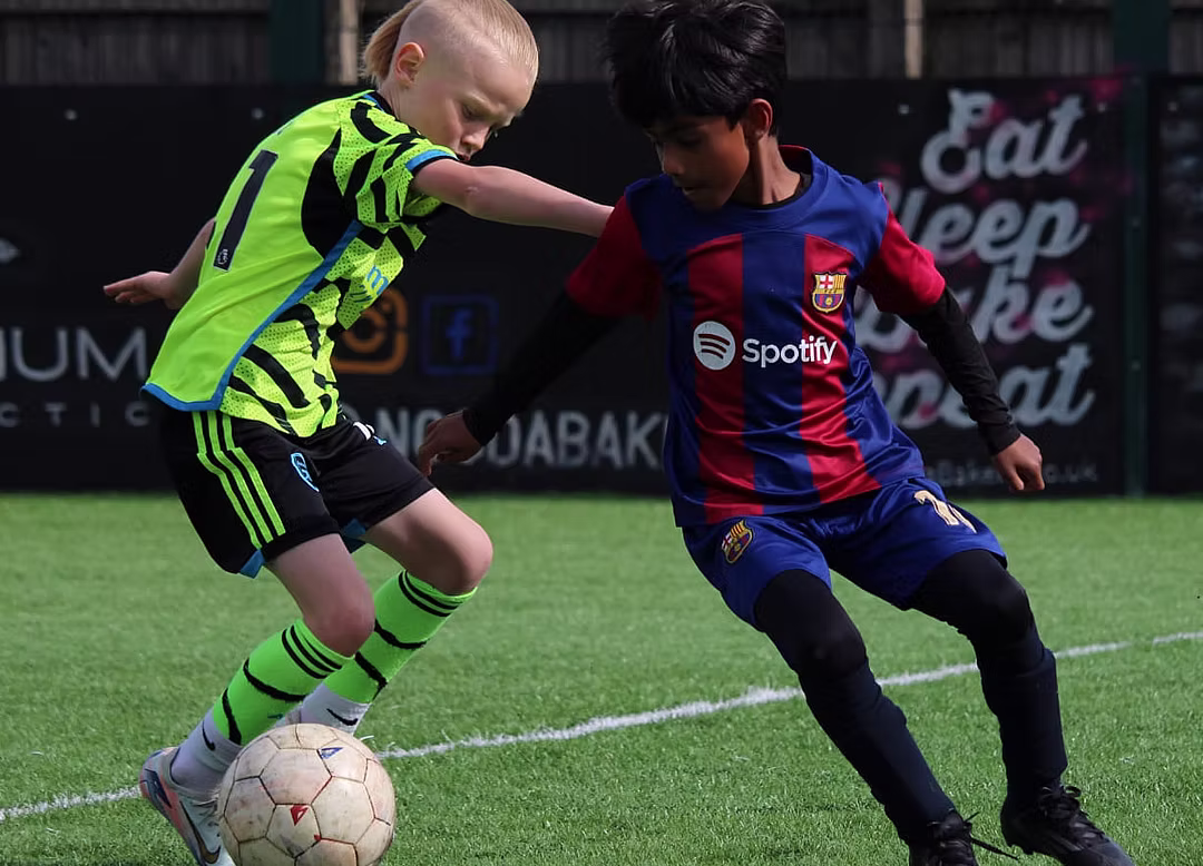 Kids playing football
