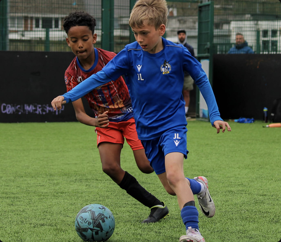 Kids playing football